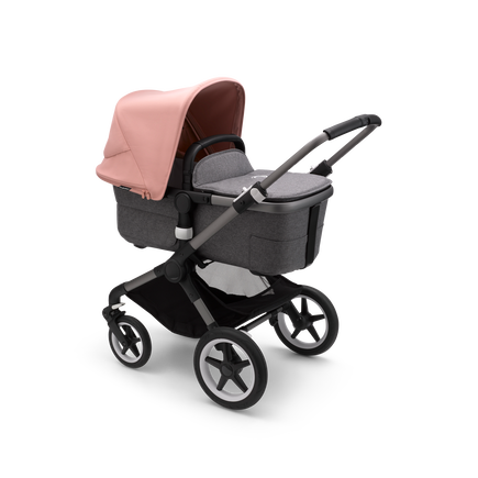 Bugaboo Fox 3 carrycot pushchair with graphite frame, grey fabrics, and pink sun canopy.
