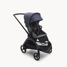 Poussette Bugaboo Dragonfly avec siège, châssis noir, housse gris chiné et capote bleu tonnerre.