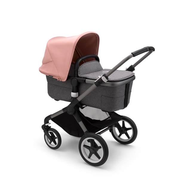 Bugaboo Fox 3 bassinet stroller with graphite frame, grey fabrics, and pink sun canopy.