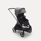 Poussette Bugaboo Dragonfly avec siège, châssis graphite, housse nuit noire et capote gris chiné.