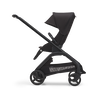 Side view of the Bugaboo Dragonfly seat stroller with black chassis, midnight black fabrics and midnight black sun canopy.
