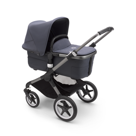 Bugaboo Fox 3 carrycot pushchair with graphite frame, stormy blue fabrics, and stormy blue sun canopy.