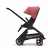 Side view of the Bugaboo Dragonfly seat stroller with black chassis, midnight black fabrics and sunrise red sun canopy. - Thumbnail Slide 2 of 16