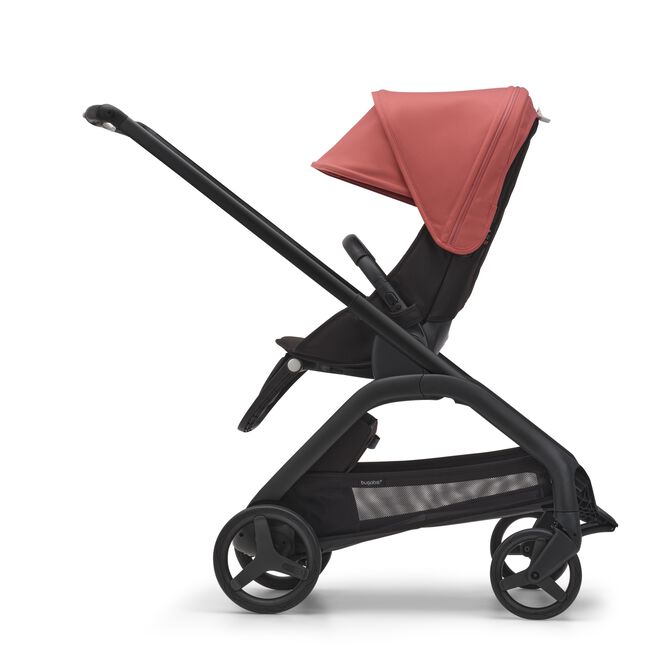 Side view of the Bugaboo Dragonfly seat stroller with black chassis, midnight black fabrics and sunrise red sun canopy.