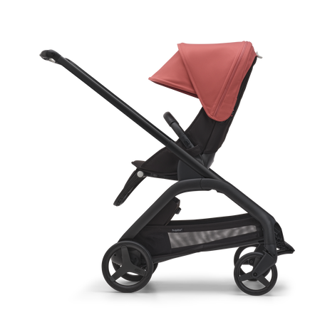 Side view of the Bugaboo Dragonfly seat stroller with black chassis, midnight black fabrics and sunrise red sun canopy. - view 2