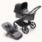 Poussette siège et nacelle Bugaboo Fox 5 avec châssis noir, habillages gris chiné et capote nuit noire.
