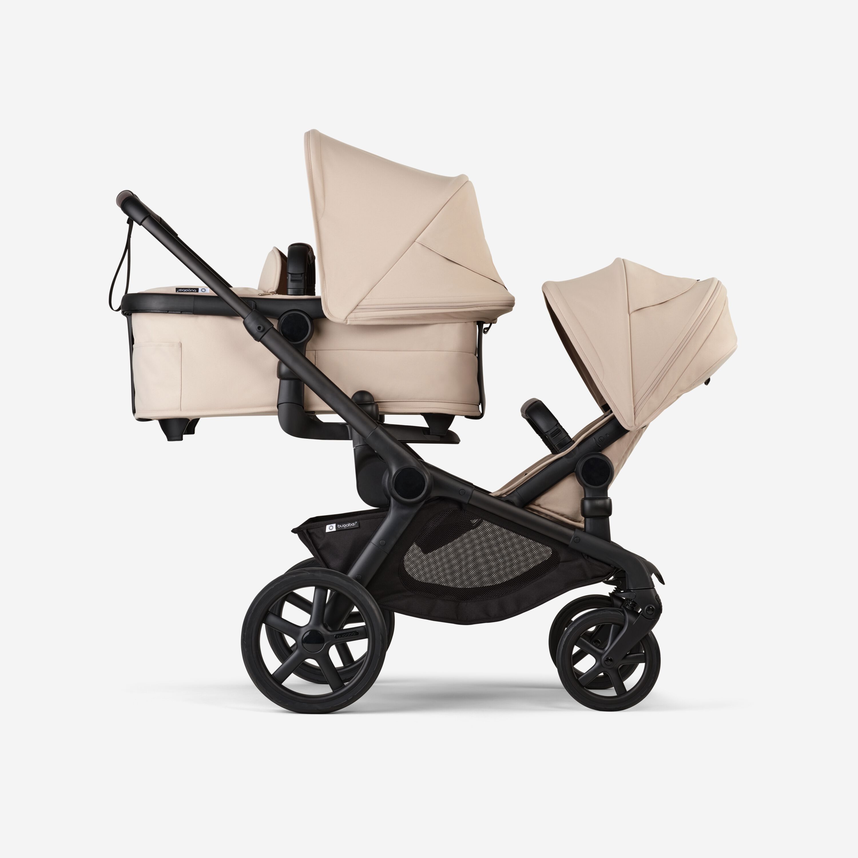 Bugaboo Kangaroo 2-in-1 tandem stroller with one bassinet above and one seat below, with Desert Taupe fabrics and Desert Taupe sun canopies. - Main Modal Image Slide 2 of 18