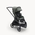 Bugaboo Dragonfly seat stroller with black chassis, forest green fabrics and forest green sun canopy.