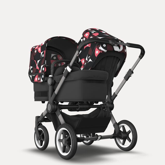 Bugaboo Donkey 5 Duo double stroller graphite base, midnight black fabrics, animal explorer pink/ red sun canopy - Main Image Slide 1 of 10