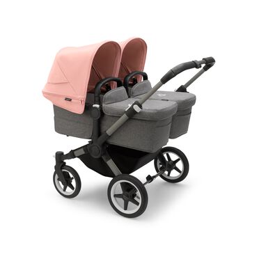 Bugaboo Donkey 5 twin stroller graphite base, grey mélange fabrics, morning pink sun canopy
