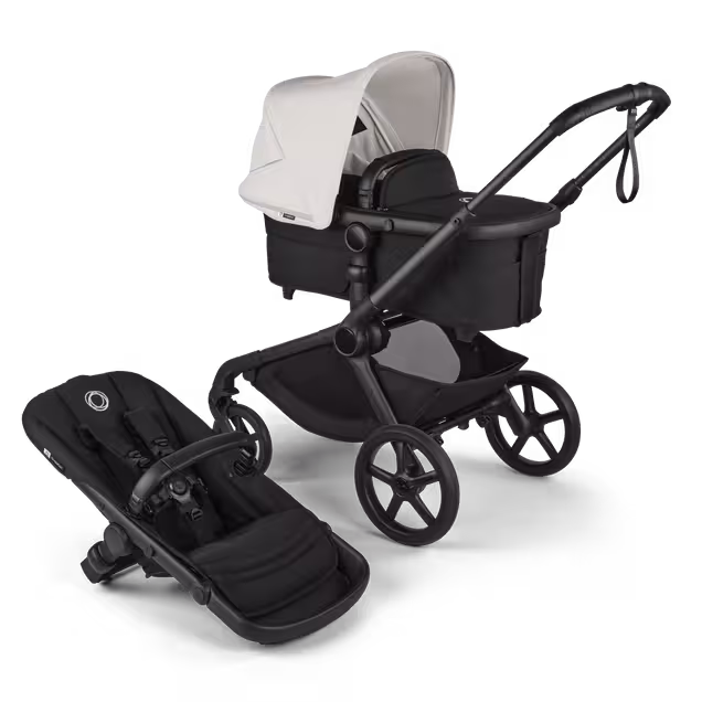 Bugaboo Kangaroo 2-in-1 stroller with one bassinet, Midnight Black fabrics, and Misty White sun canopy. A detached seat in Midnight Black sits next to the stroller. - Main Image Slide 1 of 18