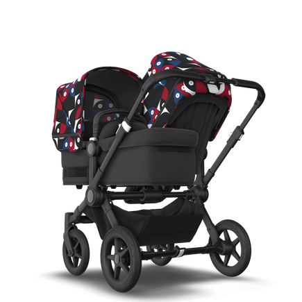 Bugaboo Donkey 5 Duo bassinet and seat stroller black base, midnight black fabrics, animal explorer red/ blue sun canopy - view 1