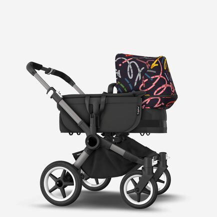 Bugaboo Donkey 5 Mono bassinet and seat stroller graphite base, midnight black fabrics, art of discovery dark blue sun canopy