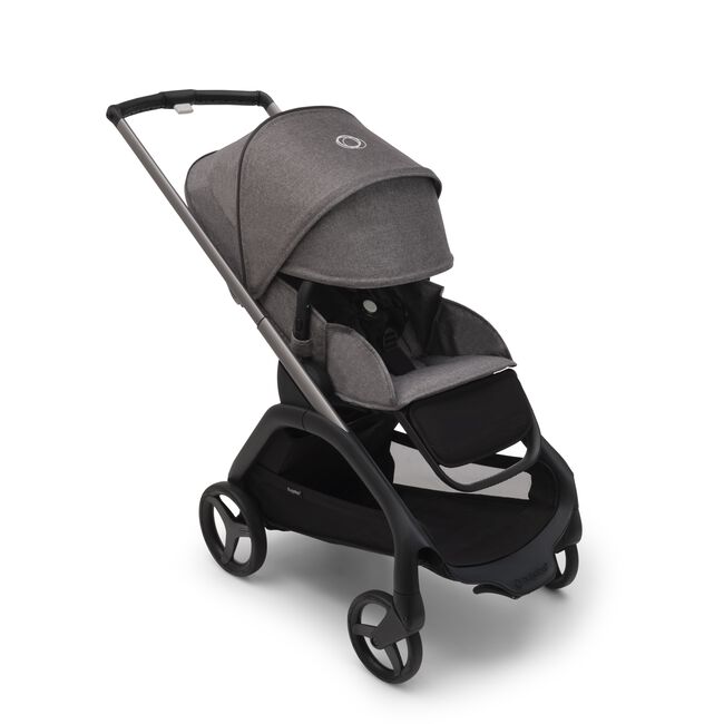 Bugaboo Dragonfly seat pram with graphite chassis, grey melange fabrics and grey melange sun canopy. The sun canopy is fully extended.