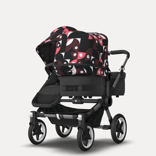 Bugaboo Donkey 5 Duo double stroller graphite base, midnight black fabrics, animal explorer pink/ red sun canopy - Main Image Slide 3 of 10