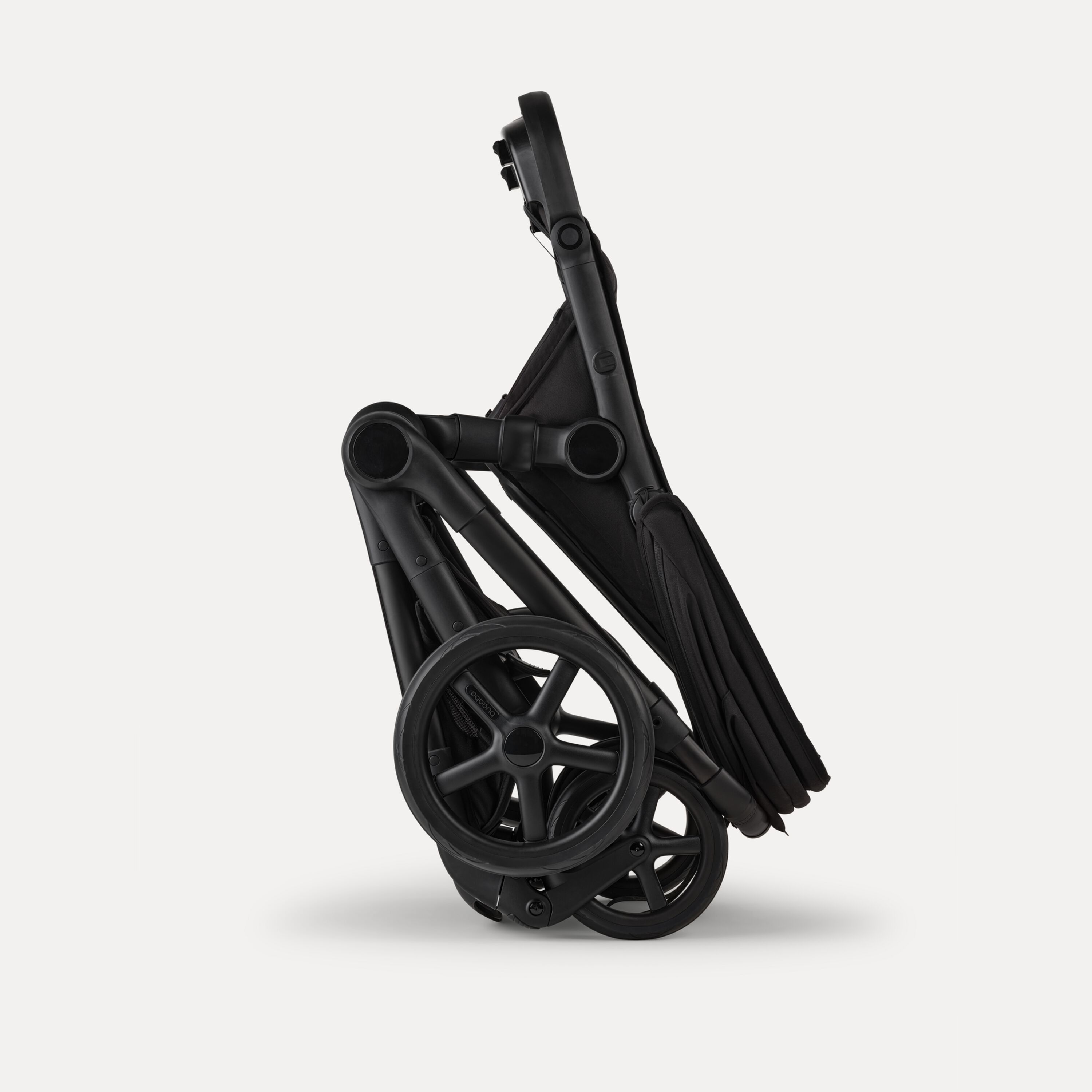 A Bugaboo Kangaroo 2-in-1 stroller in a compact one-piece fold. - Main Modal Image Slide 12 of 18