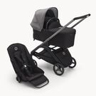 Refurbished Bugaboo Dragonfly bassinet and seat stroller graphite base, midnight black fabrics, grey melange sun canopy
