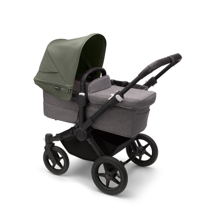Bugaboo Donkey 5 Mono bassinet stroller with black chassis, grey melange fabrics and forest green sun canopy.
