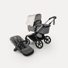 Bugaboo Fox 5 Renew bassinet and seat 2-in-1 stroller, with graphite chassis, Moon Grey fabrics, and Misty White sun canopy.