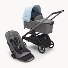 Poussette siège et nacelle Bugaboo Dragonfly avec châssis graphite, habillages gris chiné et capote bleu horizon.