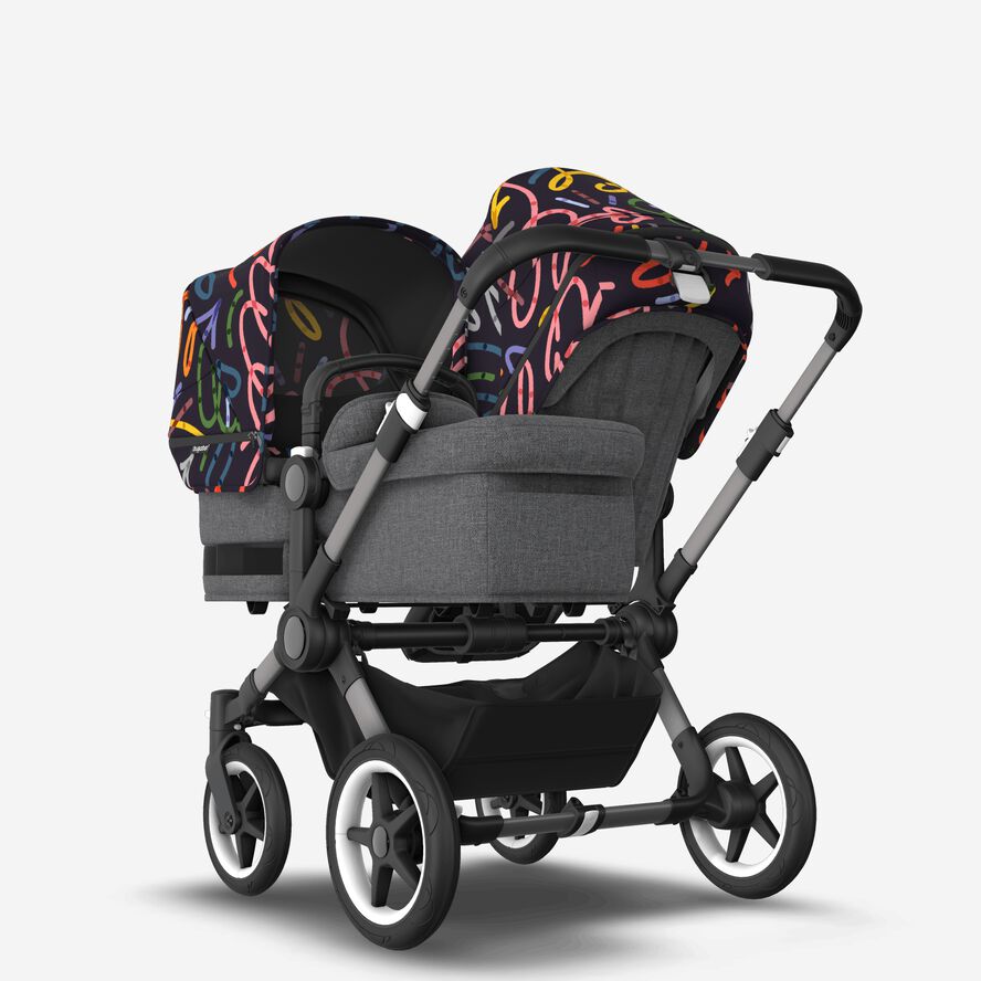 Bugaboo Donkey 5 Duo bassinet and seat stroller graphite base, grey mélange fabrics, art of discovery dark blue sun canopy