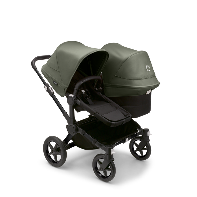 Bugaboo Donkey 5 Duo bassinet and seat stroller black base, midnight black fabrics, forest green sun canopy