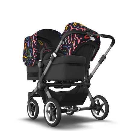 Bugaboo Donkey 5 Duo bassinet and seat stroller graphite base, midnight black fabrics, art of discovery dark blue sun canopy