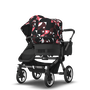 Bugaboo Donkey 5 Duo bassinet and seat stroller graphite base, midnight black fabrics, animal explorer pink/ red sun canopy