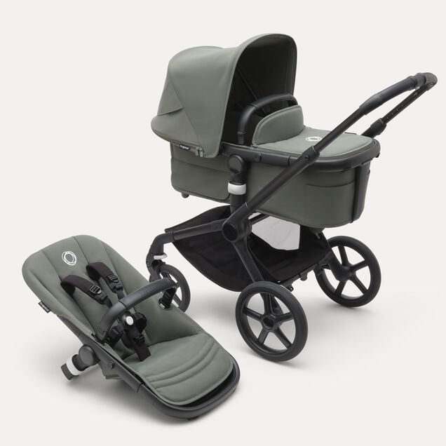 Bugaboo Fox 5 carrycot and seat pushchair with black chassis, forest green fabrics and forest green sun canopy. - Main Image Slide 1 of 13
