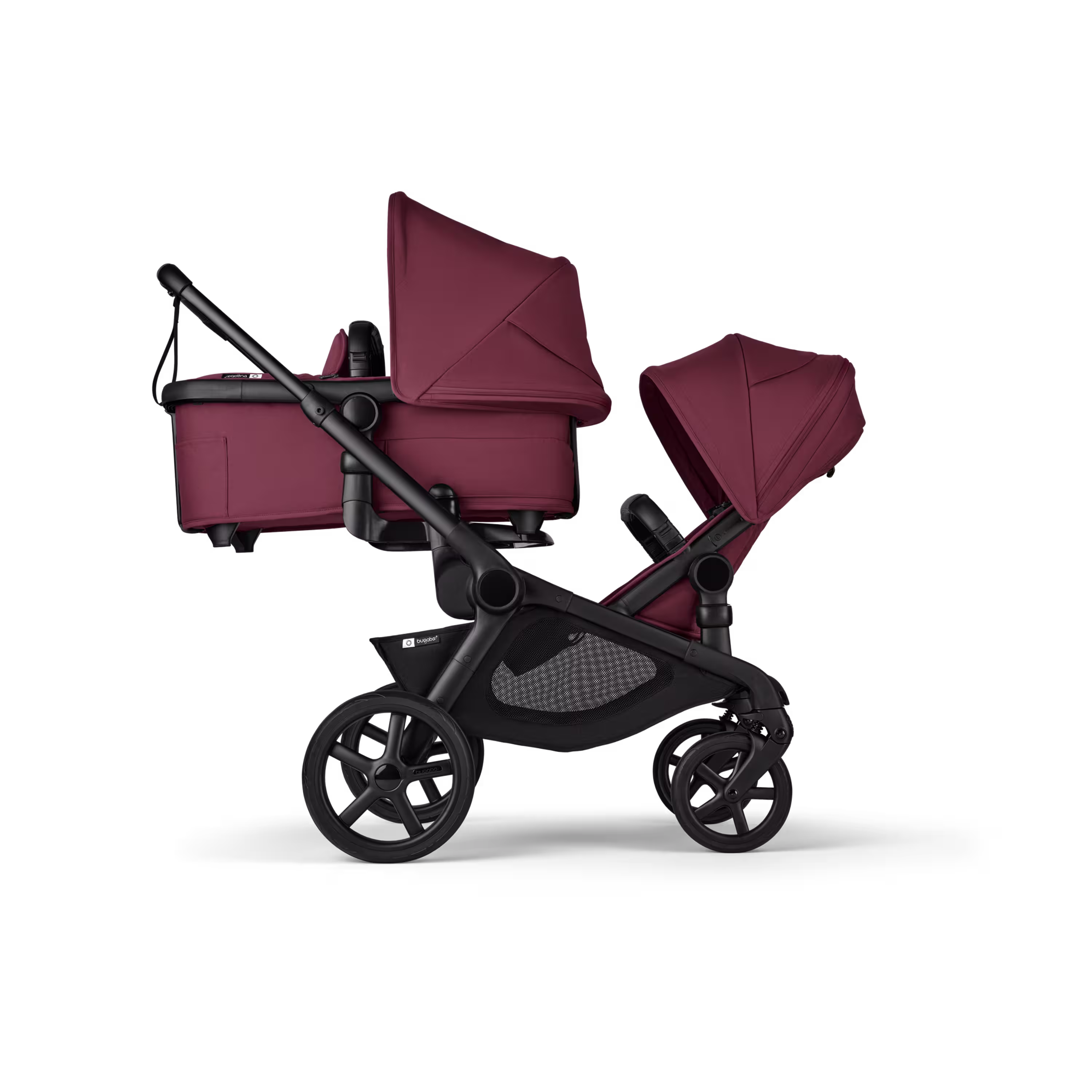 Bugaboo Kangaroo 2-in-1 tandem stroller with one bassinet above and one seat below, with Dark Cherry fabrics and Dark Cherry sun canopies. - Main Modal Image Slide 2 of 18