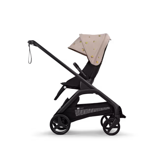 Bugaboo x Konges SlØjd limited edition Dragonfly bassinet and seat stroller black base, midnight black fabrics, desert taupe melange sun canopy - Main Image Slide 2 of 16
