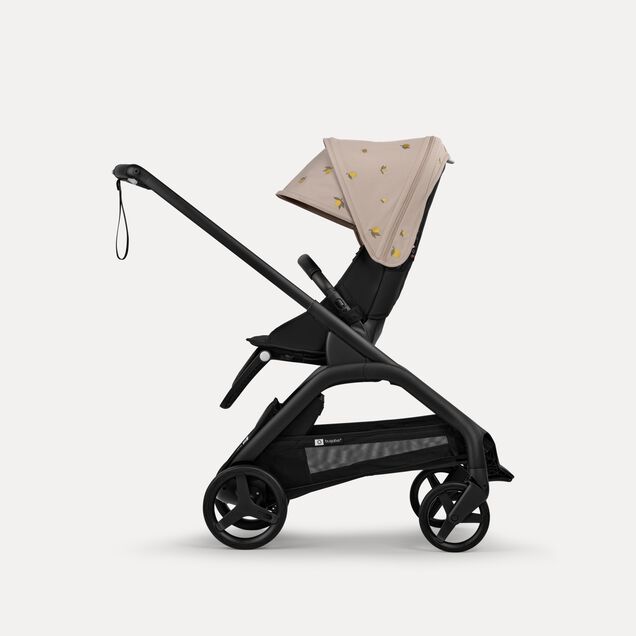 Bugaboo x Konges SlØjd limited edition Dragonfly bassinet and seat stroller black base, midnight black fabrics, desert taupe melange sun canopy - Main Image Slide 2 of 16