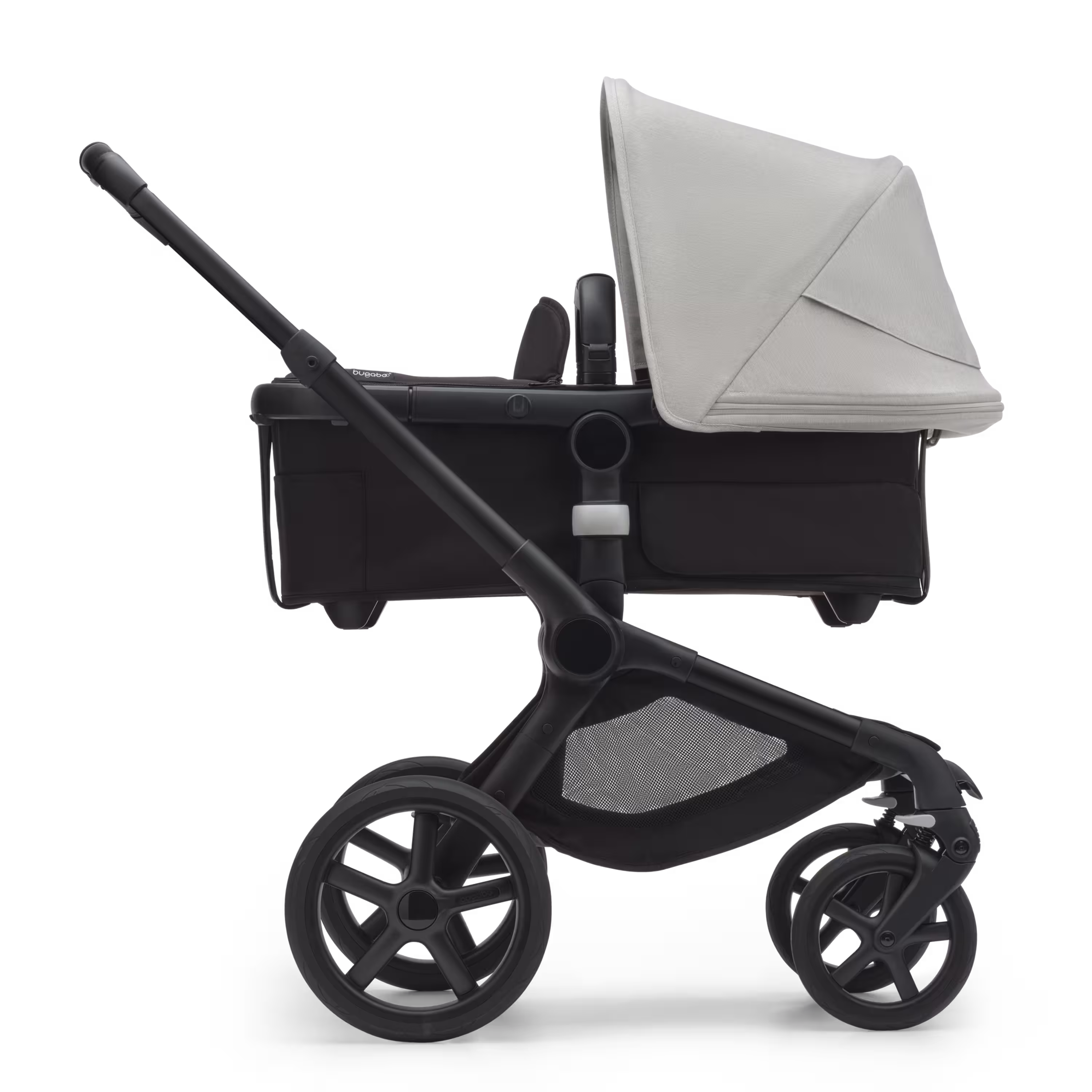 Side view of the Bugaboo Fox 5 bassinet stroller with black chassis, midnight black fabrics and misty white sun canopy. - Main Modal Image Slide 2 of 12