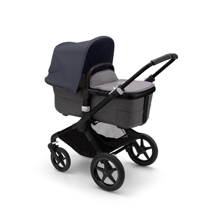 Bugaboo Fox 3 carrycot pushchair with black frame, grey fabrics, and stormy blue sun canopy.