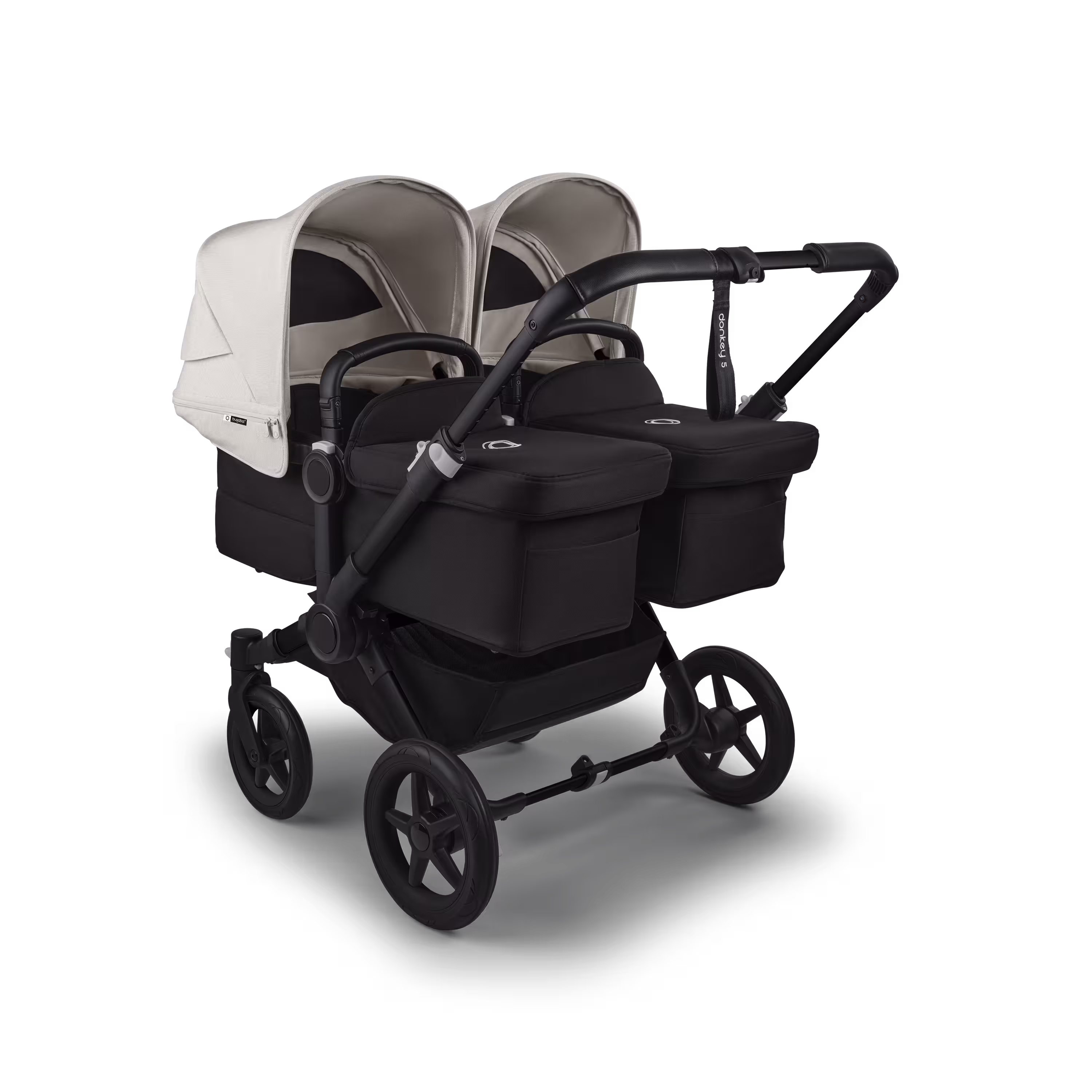 Bugaboo Donkey 5 twin stroller black base, midnight black fabrics, misty white sun canopy - Main Modal Image Slide 1 of 12
