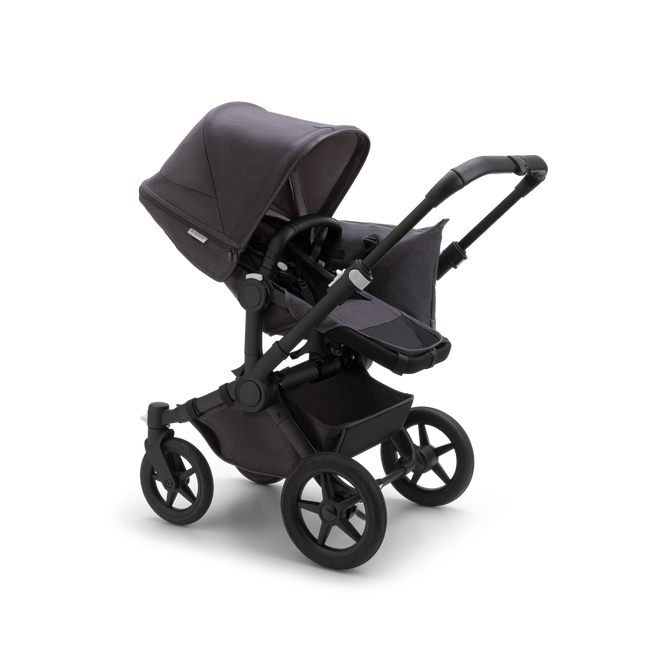Bugaboo Donkey 5 Mono seat stroller with black chassis, mineral washed black fabrics and mineral washed black sun canopy.