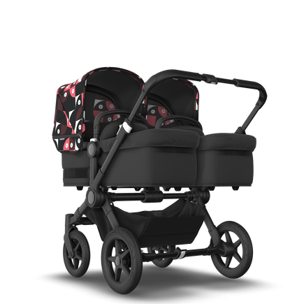 Bugaboo Donkey 5 Twin bassinet and seat stroller black base, midnight black fabrics, animal explorer pink/red sun canopy - view 1