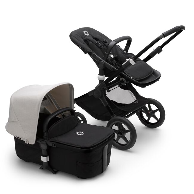 Bugaboo Fox 3 pram body and seat stroller with black frame, black fabrics, and white sun canopy. - Main Image Slide 5 of 9
