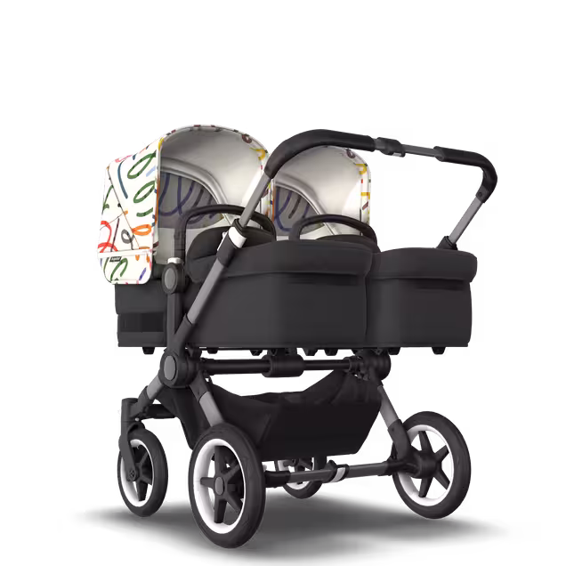 Bugaboo Donkey 5 twin stroller graphite base, midnight black fabrics, art of discovery white sun canopy - Main Image Slide 1 of 12