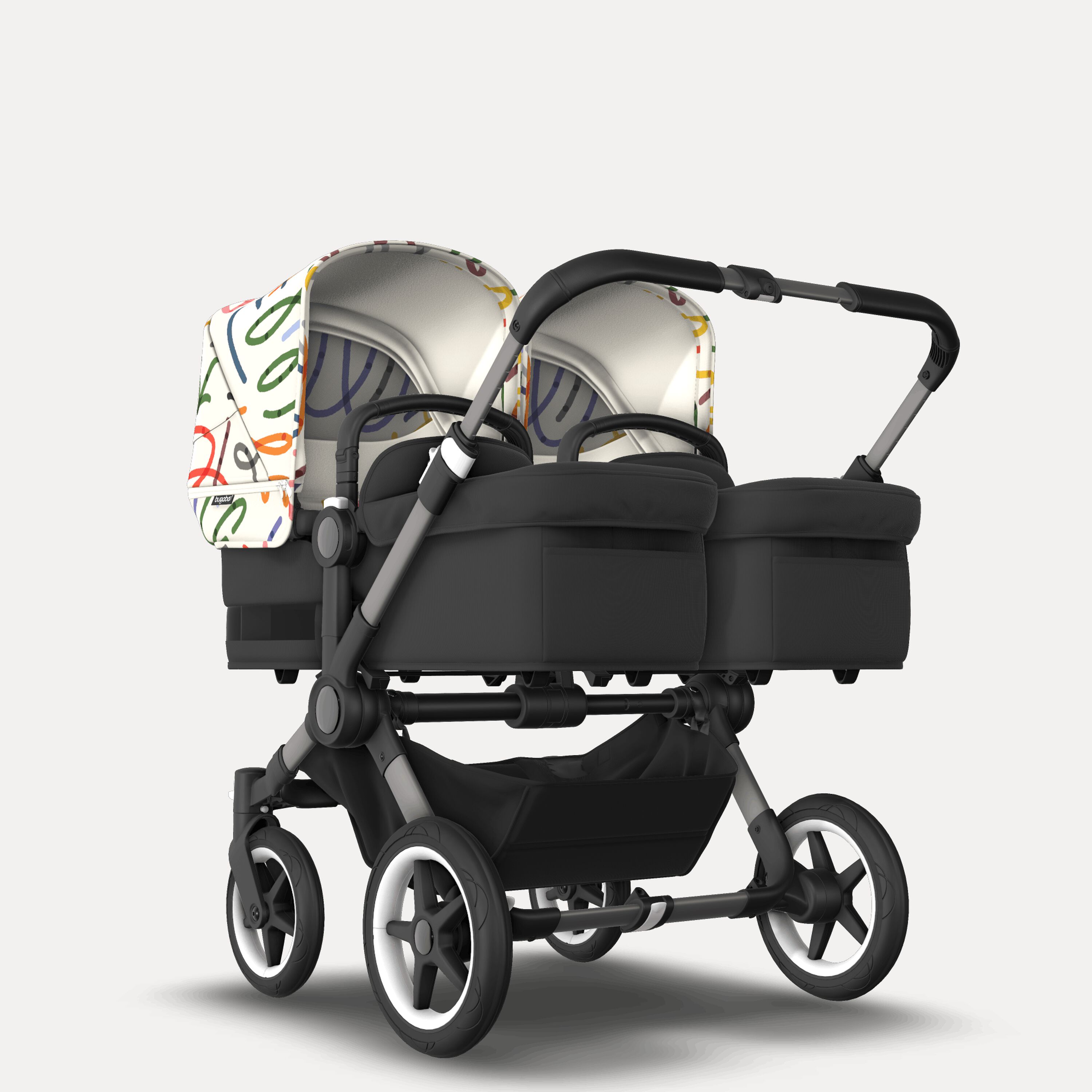 Bugaboo Donkey 5 twin stroller graphite base, midnight black fabrics, art of discovery white sun canopy - Main Modal Image Slide 1 of 12
