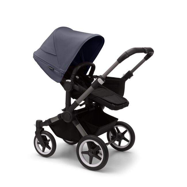 Bugaboo Donkey 5 Mono seat stroller with graphite chassis, midnight black fabrics and stormy blue sun canopy.