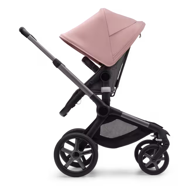 Side view of the Bugaboo Fox 5 seat pushchair with graphite chassis, grey melange fabrics and morning pink sun canopy. - Main Image Slide 3 of 13