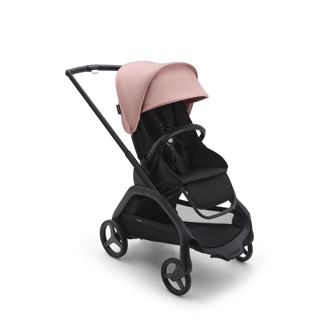 Bugaboo Dragonfly seat stroller with black chassis, midnight black fabrics and morning pink sun canopy.