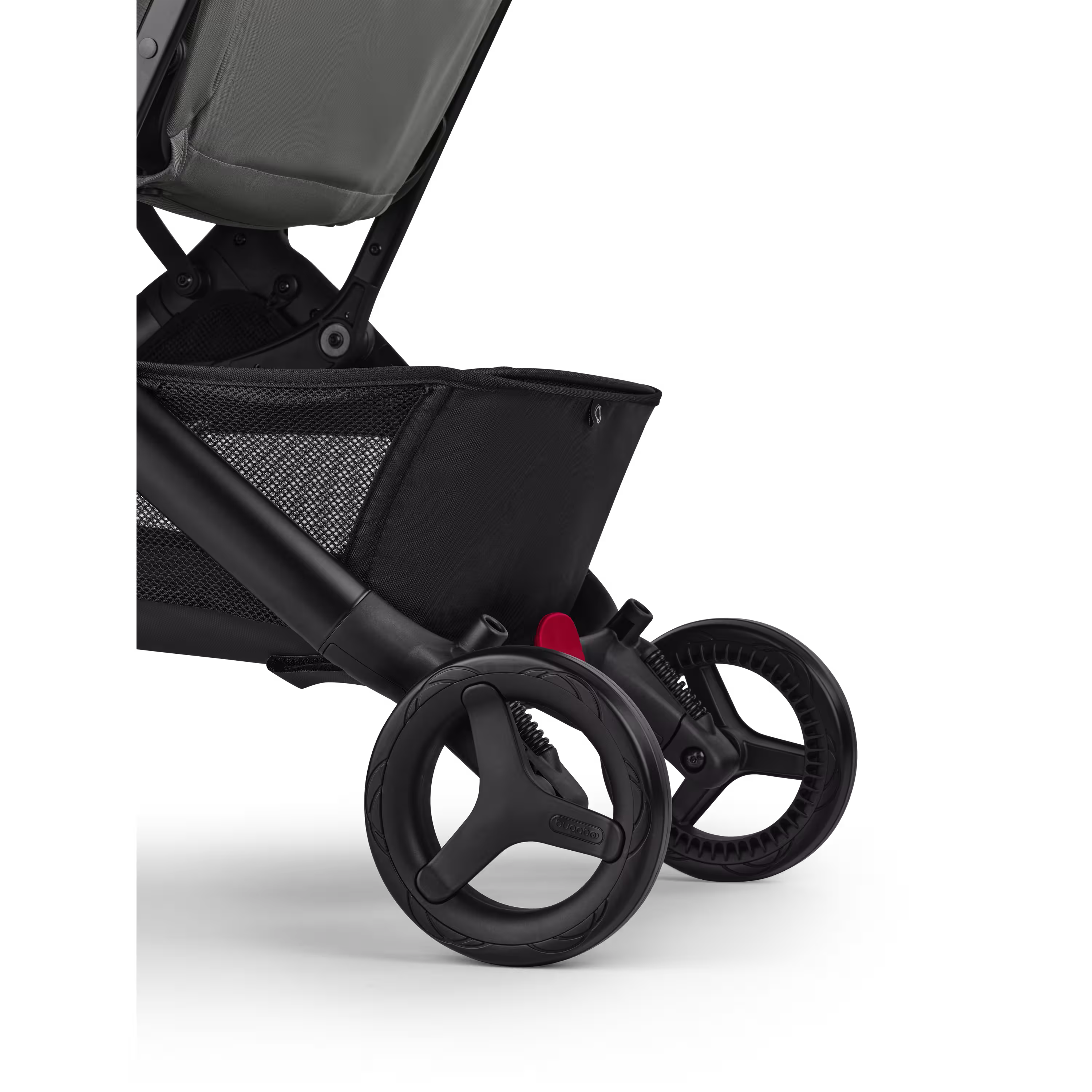 A close up of the rear wheels of the Bugaboo Butterfly 2 travel pram. - Main Modal Image Slide 7 of 9