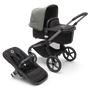 Bugaboo Fox 5 bassinet and seat pram with graphite chassis, midnight black fabrics and forest green sun canopy.