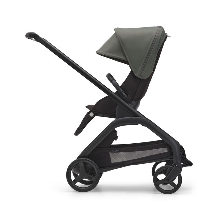 Side view of the Bugaboo Dragonfly seat stroller with black chassis, midnight black fabrics and forest green sun canopy.