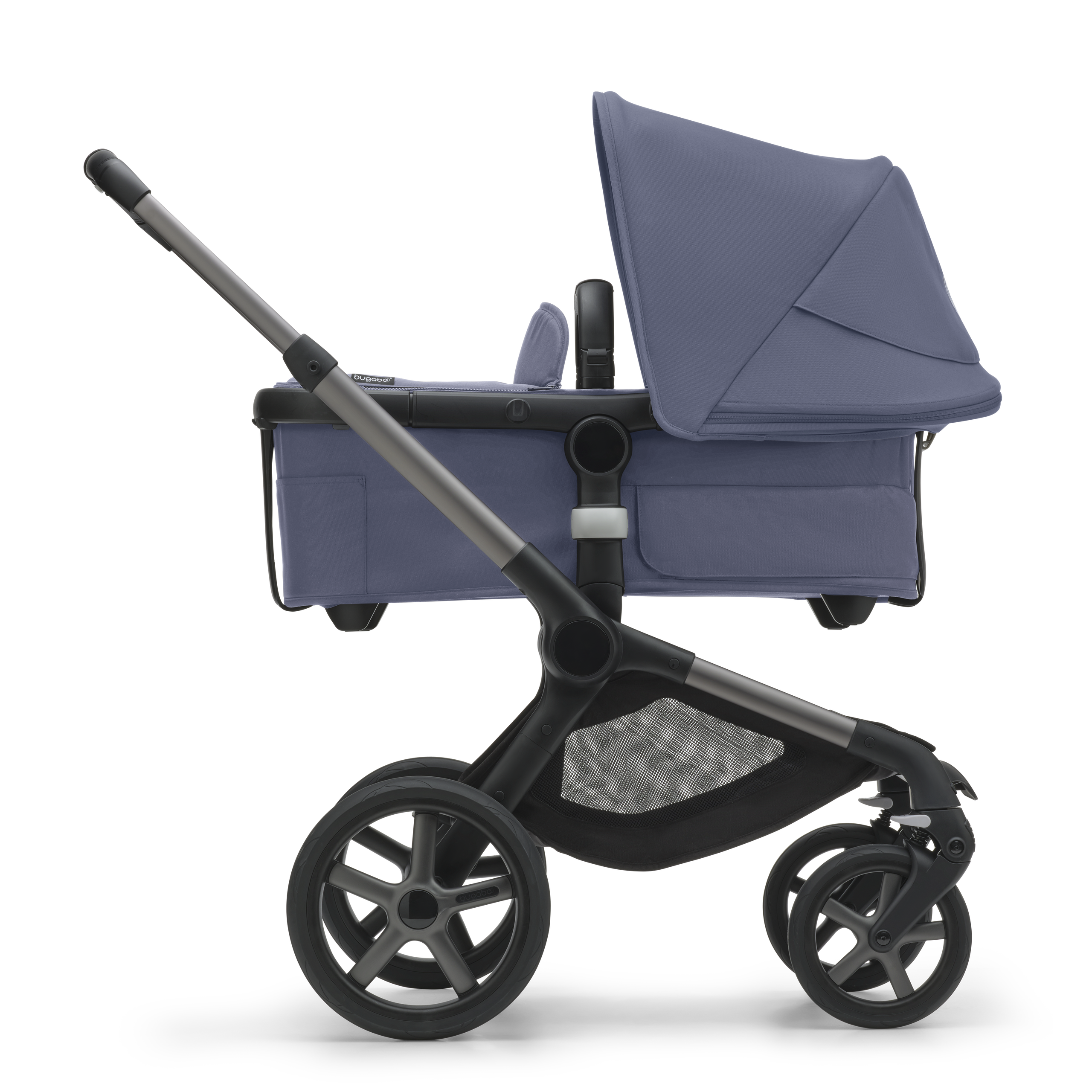 Side view of the Bugaboo Fox 5 bassinet stroller with graphite chassis, midnight black fabrics and stormy blue sun canopy. - Thumbnail Slide 2 of 12