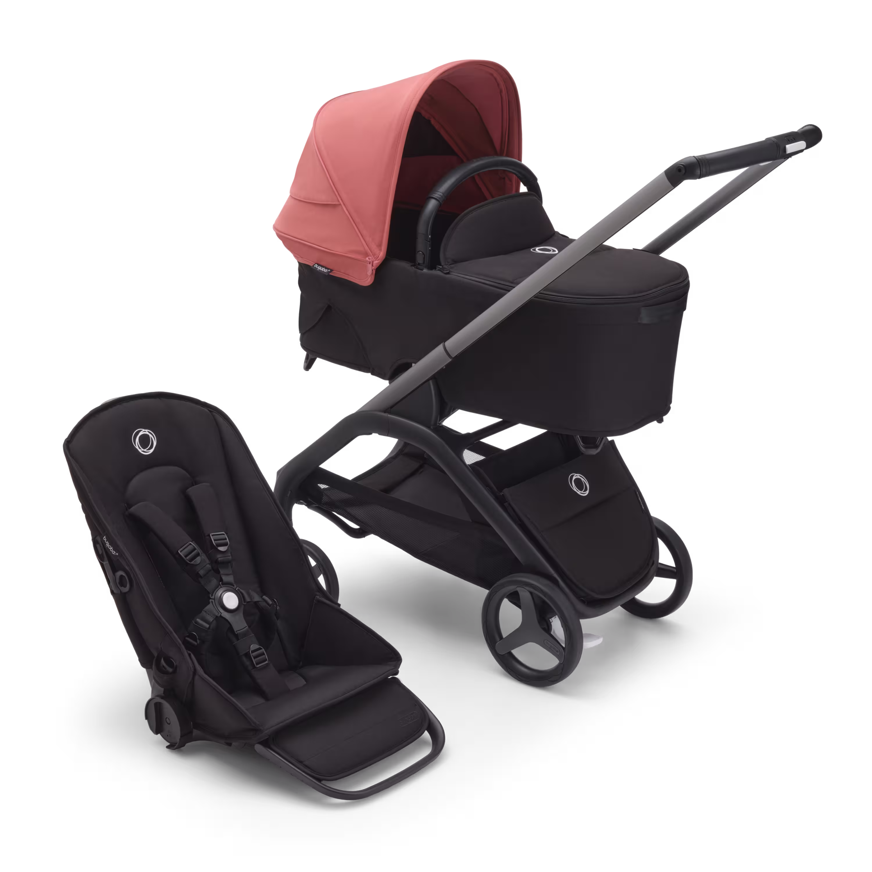 グラファイトのシャーシ、ミッドナイトブラックのファブリック、サンライズレッドのサンキャノピーを装着したバガブー ドラゴンフライ キャリーコット＆シートストローラー。 - Main Modal Image Slide 1 of 16