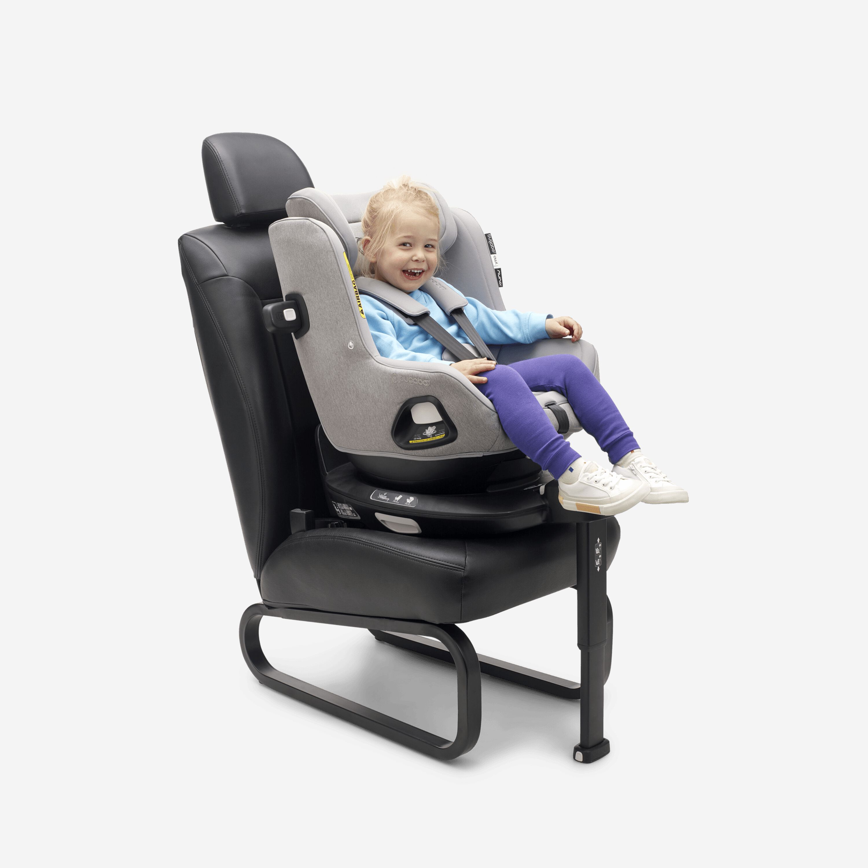 A happy toddler safely seated in the Bugaboo Owl by Nuna with 360 ISOFIX Base. - Main Modal Image Slide 7 of 11