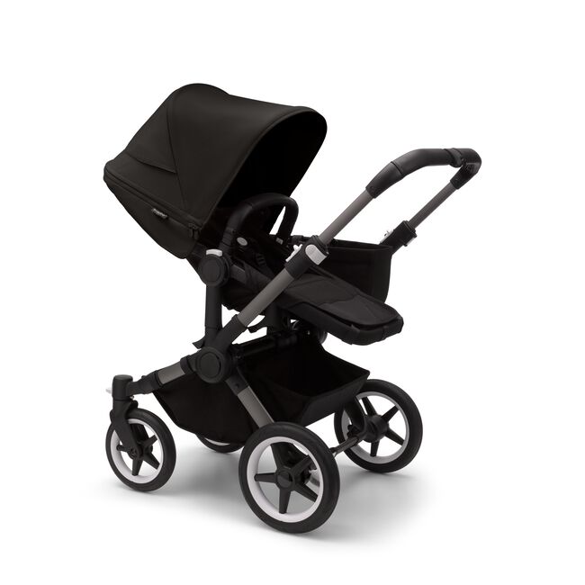 Bugaboo Donkey 5 Mono seat stroller with graphite chassis, midnight black fabrics and midnight black sun canopy.